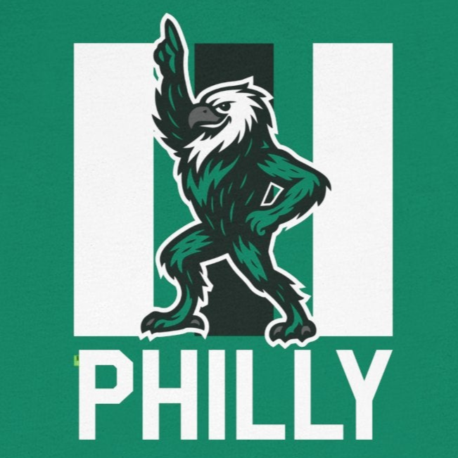 Green t-shirt with a graphic design and 'PHILLY' text on a white background