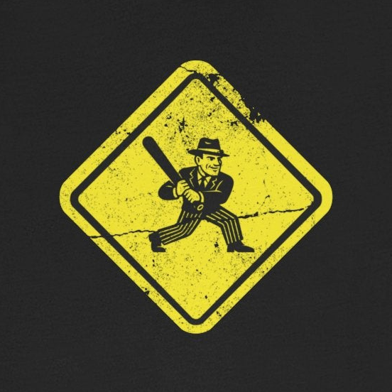 Black t-shirt with a yellow warning sign graphic on a white background
