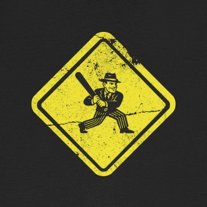 Black t-shirt with a yellow warning sign graphic on a white background