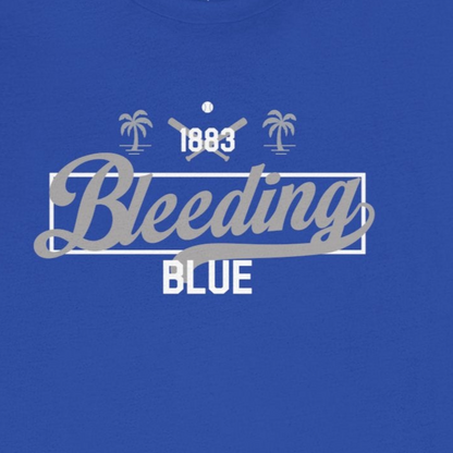 Blue t-shirt with '1983 Bleeding Blue' text on a white background