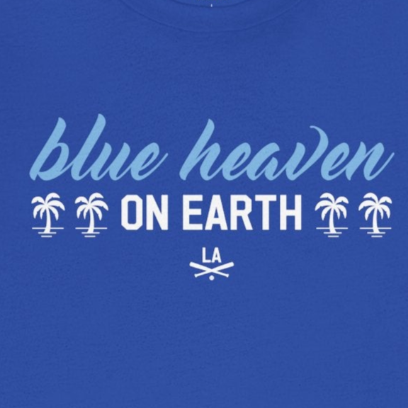 Blue t-shirt with 'blue heaven ON EARTH' text on a white background